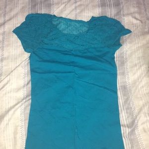 Shirt by a store called ladybug that closed